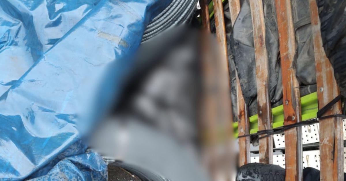 Momento en el que la Policía encontró el cadáver. FOTO: CORTESÍA