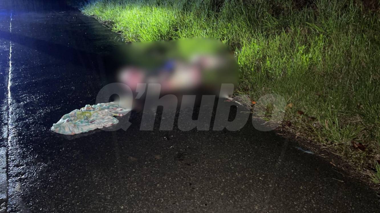 Cuerpo encontrado a borde de la autopisra Norte en Copacabana. FOTO: CORTESÍA