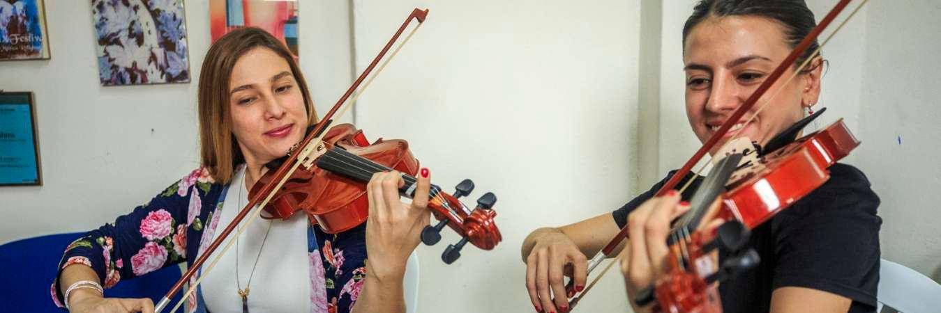 Centenares de jóvenes antioqueños han pasado por las escuelas de la Red de Músicas de Medellín. / FOTO: CAMILO SUÁREZ. 
