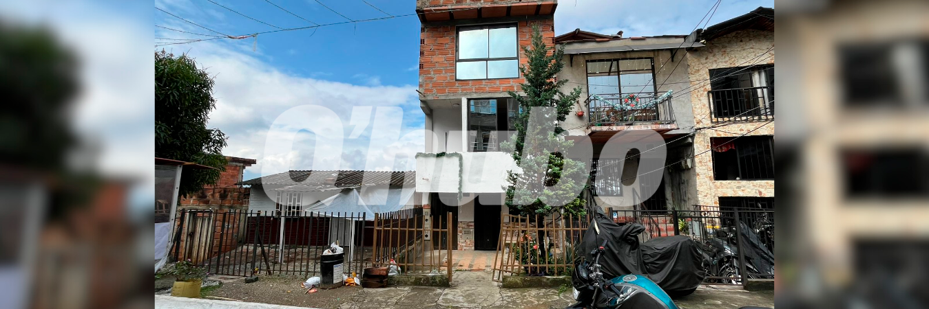 En la vivienda de tres pisos (centro) ocurrieron los hechos. /FOTO: ANDRÉS FELIPE OSORIO GARCÍA 