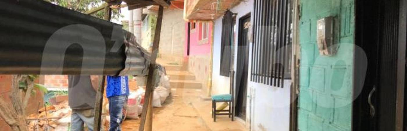 Esta es la casa verde donde se encontraba trabajando la víctima. FOTO: LAURA ROSA JIMÉNEZ