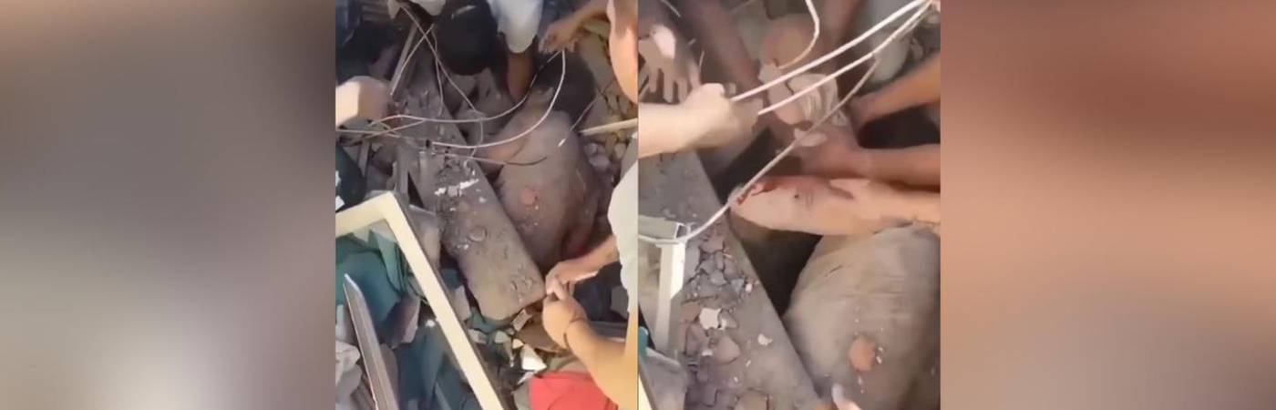 Rescate de un bebé bajo los escombros en Cali. FOTO: REDES
