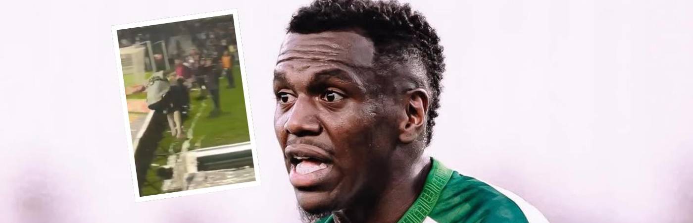 El jugador brasileño Jacy Maranhão (fondo) al saltar la valla publicitaria y caer al vestuario (detalle). FOTO: REDES Y @_JACY97