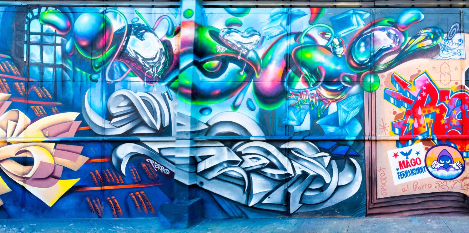 Parte del mural intervenido por Numak y Perro Graff. FOTO: CORTESÍA