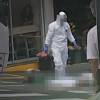Levantamiento del cuerpo del adulto mayor en Bello. FOTO: CORTESÍA DENUNCIAS ANTIOQUIA