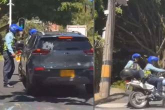 Momento en que se presentó el inconveniente entre el agente y el conductor. /FOTOS: DENUNCIAS ANTIOQUIA