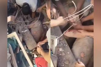 Rescate de un bebé bajo los escombros en Cali. FOTO: REDES