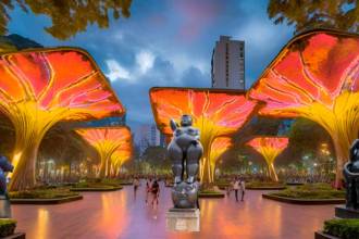 Plaza de Botero con árboles gigantes luminosos. /FOTO: IA CANVA