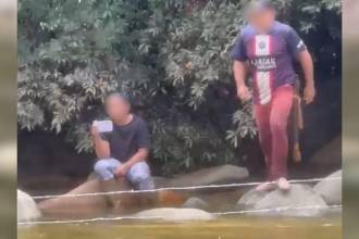 De acuerdo con los videos de las denuncias, estas dos personas estarían detrás del cerramiento. FOTO: MI ORIENTE