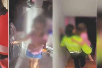 Unidades del Cuerpo Oficial de Bomberos Medellín fueron las encargadas de abrir la puerta de la casa donde estaba sola la menor de edad que fue sacada por policías de Infancia y Adolescencia. / FOTO: CAPTURAS DE VIDEO POLICÍA