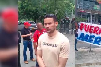 José Luis Chunga (izq) hablando con hinchas del Independiente Medellín. FOTO: LA PUTERÍA ROJA OFICIAL 