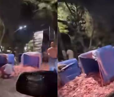 Así se veía la cantidad de alimentos regados en la vía pública. FOTOS: CAPTURAS DE VIDEO FACEBOOK PRENSA PAISA