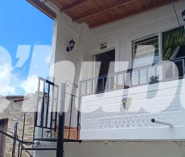 En esta casa del barrio Doce de Octubre fue donde encontraron sin vida a Antonio José Zapata Miranda, de 72 años. FOTO: Q’HUBO MEDELLÍN
