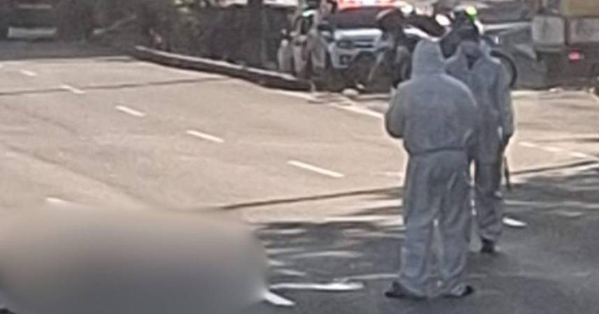 Peritos de la Secretaría de Movilidad de Envigado se encargaron de la inspección judicial al cuerpo. FOTO: CORTESÍA